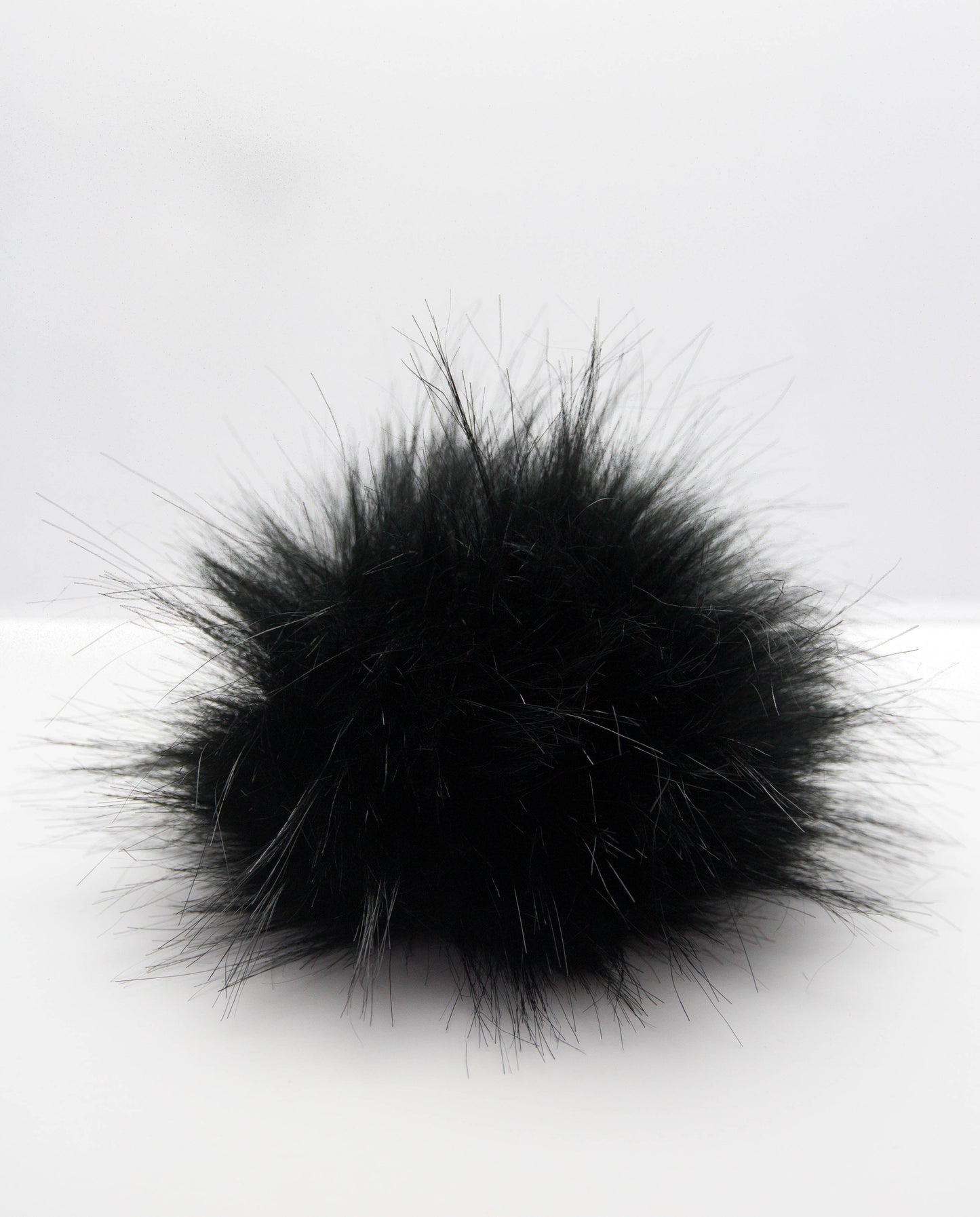 black pompom.